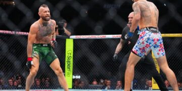 Conor McGregor sofre lesão e perde para Max Holloway no UFC 329
